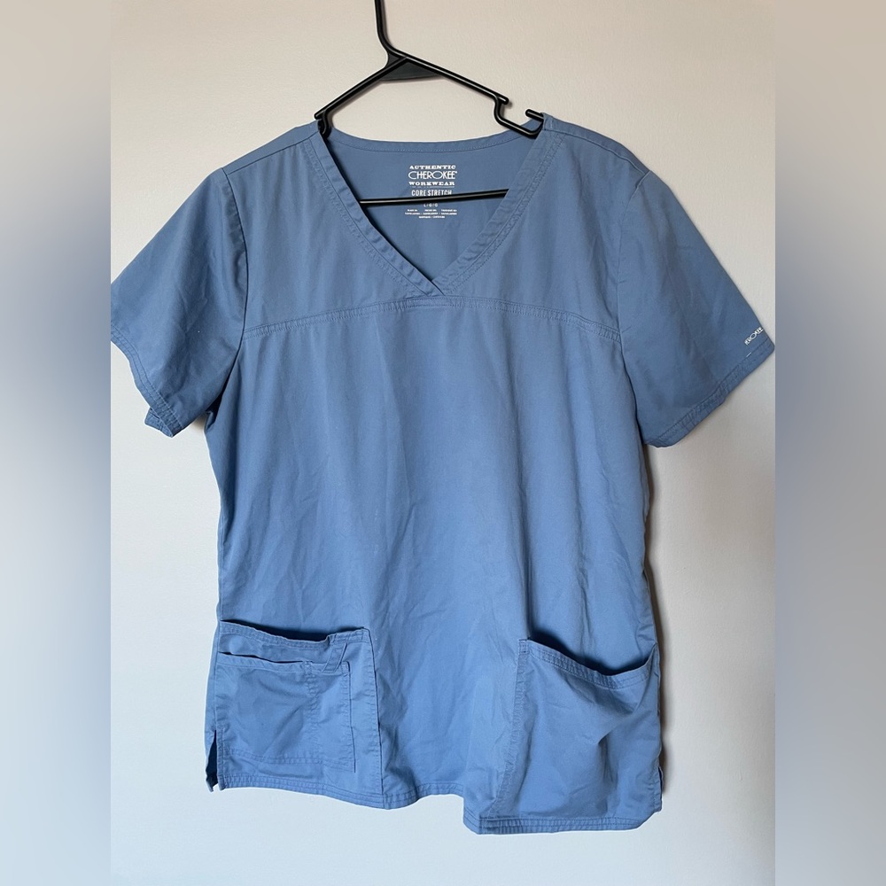Cherokee women’s scrub top size large. Light blue. Preowned good condition